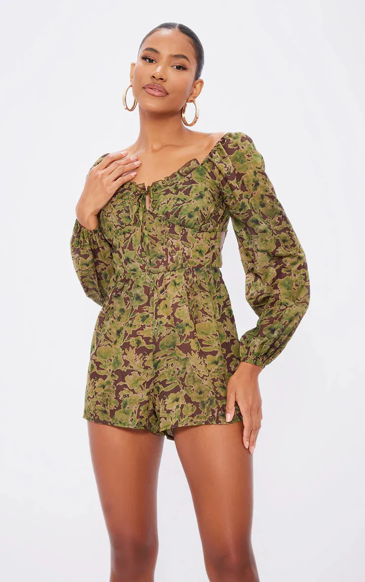 Floral printed tie back cut out playsuit in green